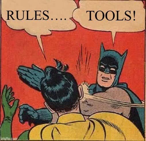 Robin begins “Rules…” and Batman replies “Tools!” in the familiar comic slap panel.
