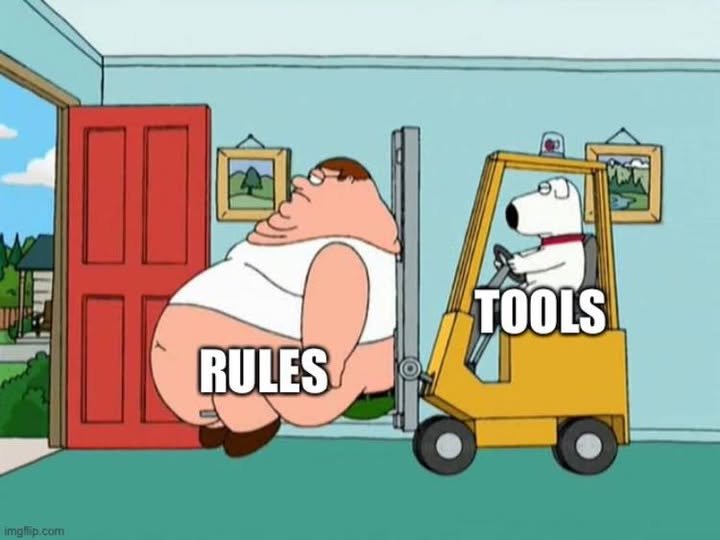Family Guy: Brian drives a forklift labeled TOOLS, lifting Peter, labeled RULES, toward a doorway.