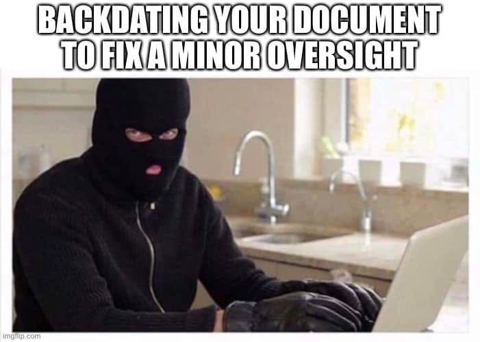 Masked person at a laptop under Backdating your document to fix a minor oversight.