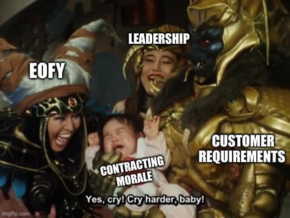 A crying child labelled Contracting Morale is surrounded by costumed characters labelled EOFY, Leadership and Customer Requirements, saying Cry harder.